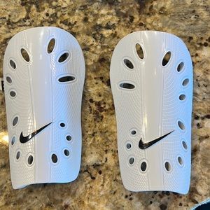 Nike Soccer shin guards with black shin sleeves